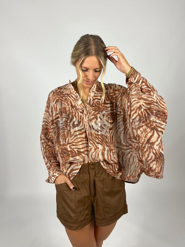 Caught In Motion Blouse