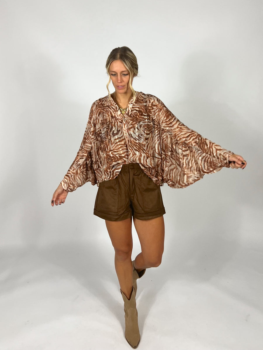 Caught In Motion Blouse