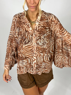 Caught In Motion Blouse